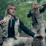 Joseph Zada como o jovem Haymitch Abernathy em cena de ação na floresta, still oficial do trailer de Sunrise on the Reaping